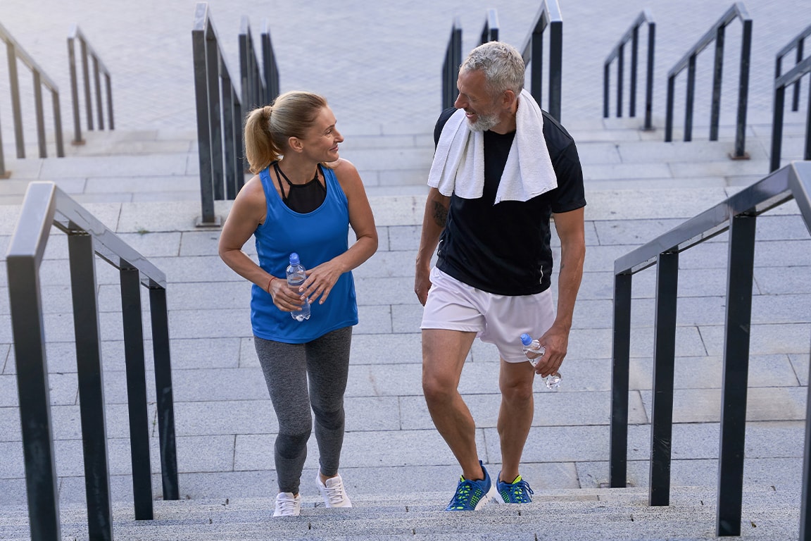 couple walking while smiling 
