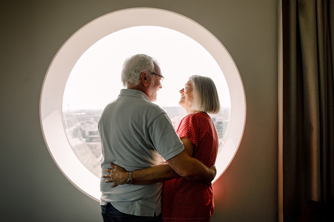 Happy mature couple hugging