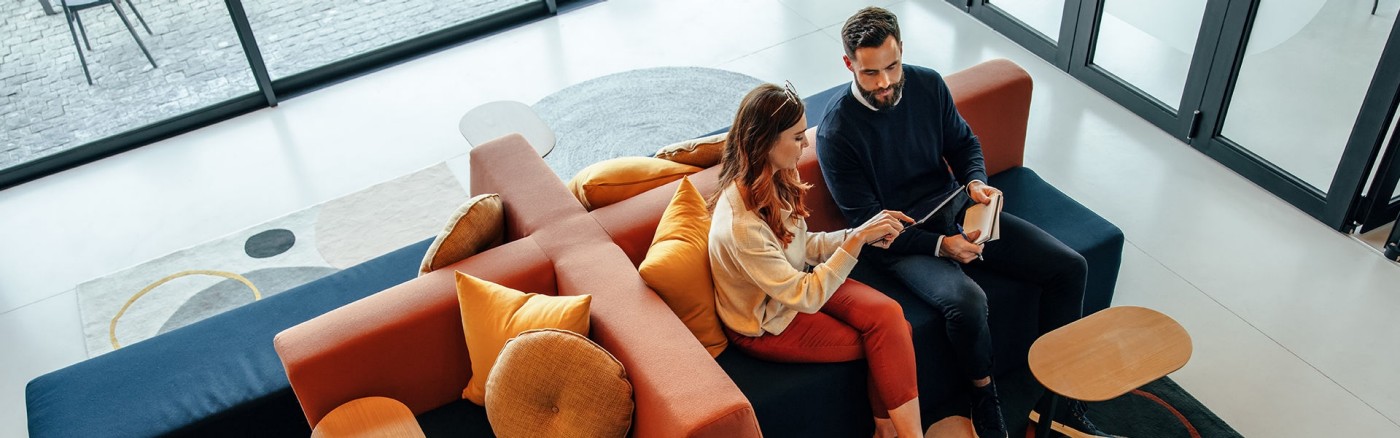 a man and a woman discussing