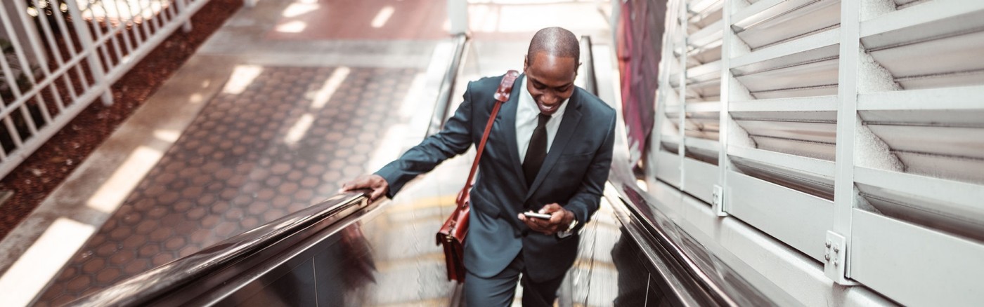 Man on escalator