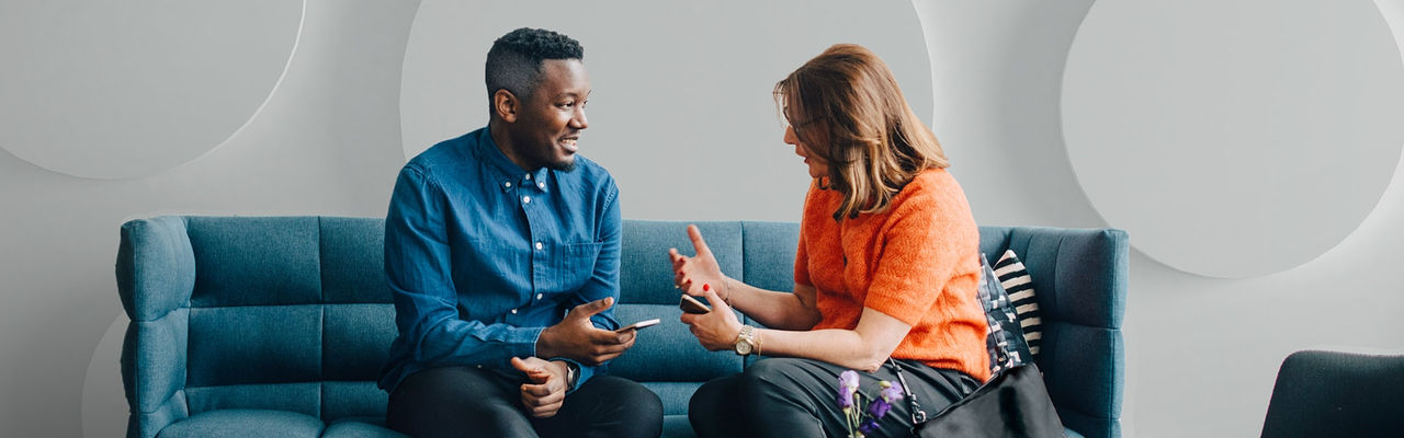 Man and woman having conversation.