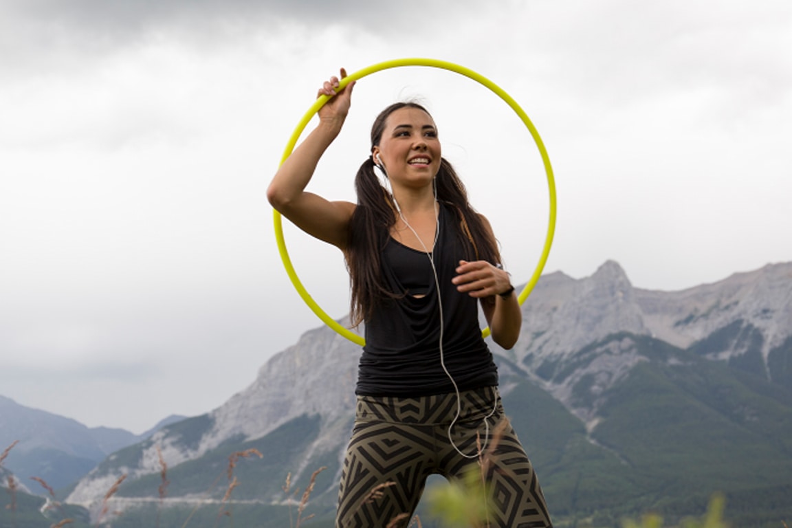 woman on hulahoop