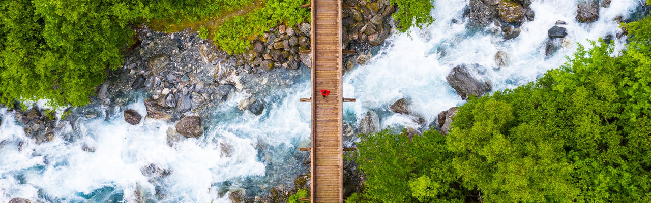 a person walking on a bridge