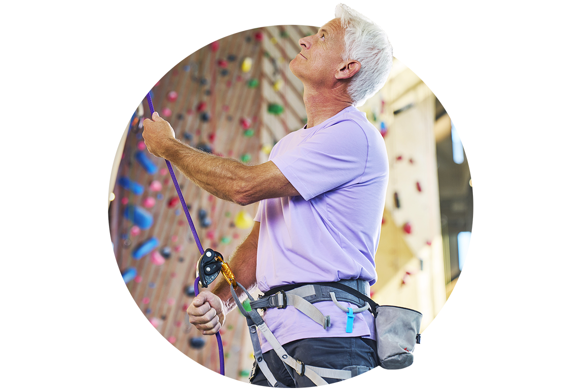 Men rock climbing