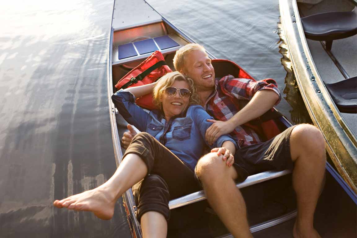 couple on a boat relaxing