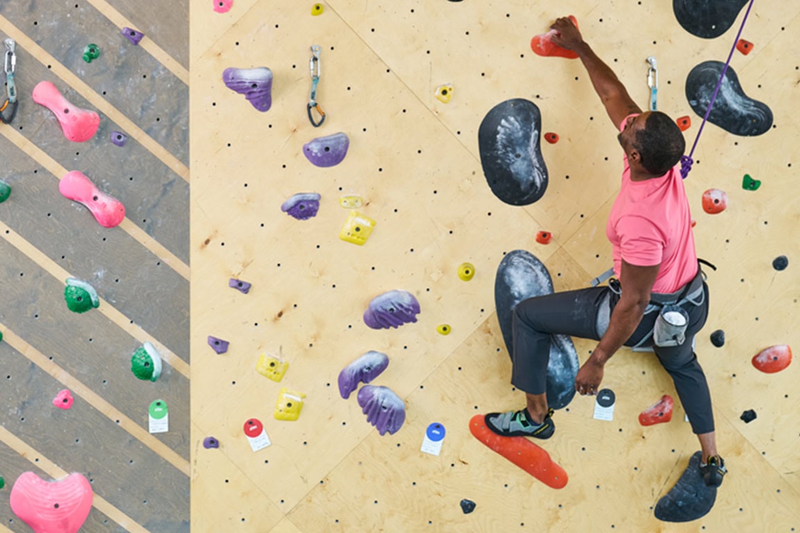 Men rock climbing