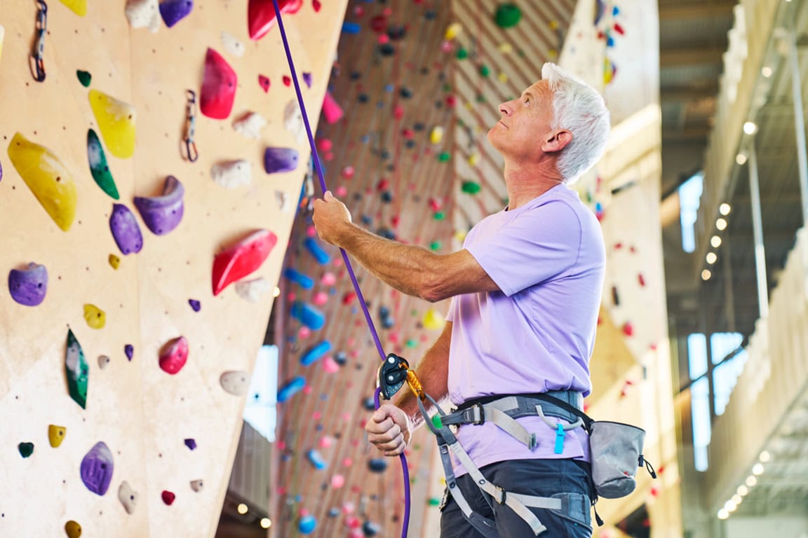 Men rock climbing 