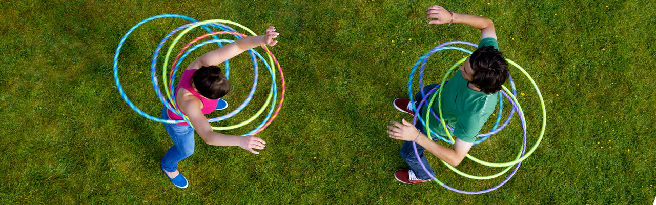 two people on a hula hoop