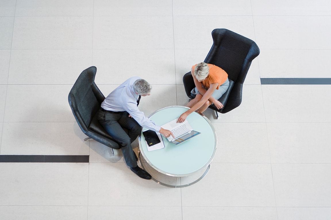 couple  looking at a laptop