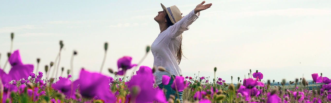 woman surrounded by flowers