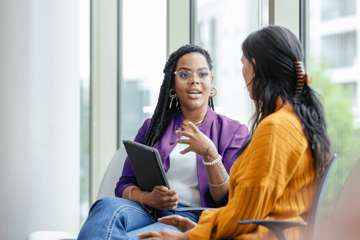 couple of women talking