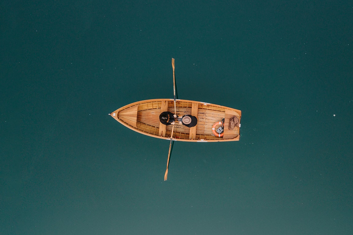 men on a canoe