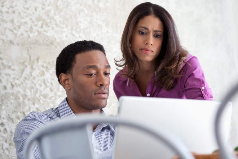 couple looking at laptop