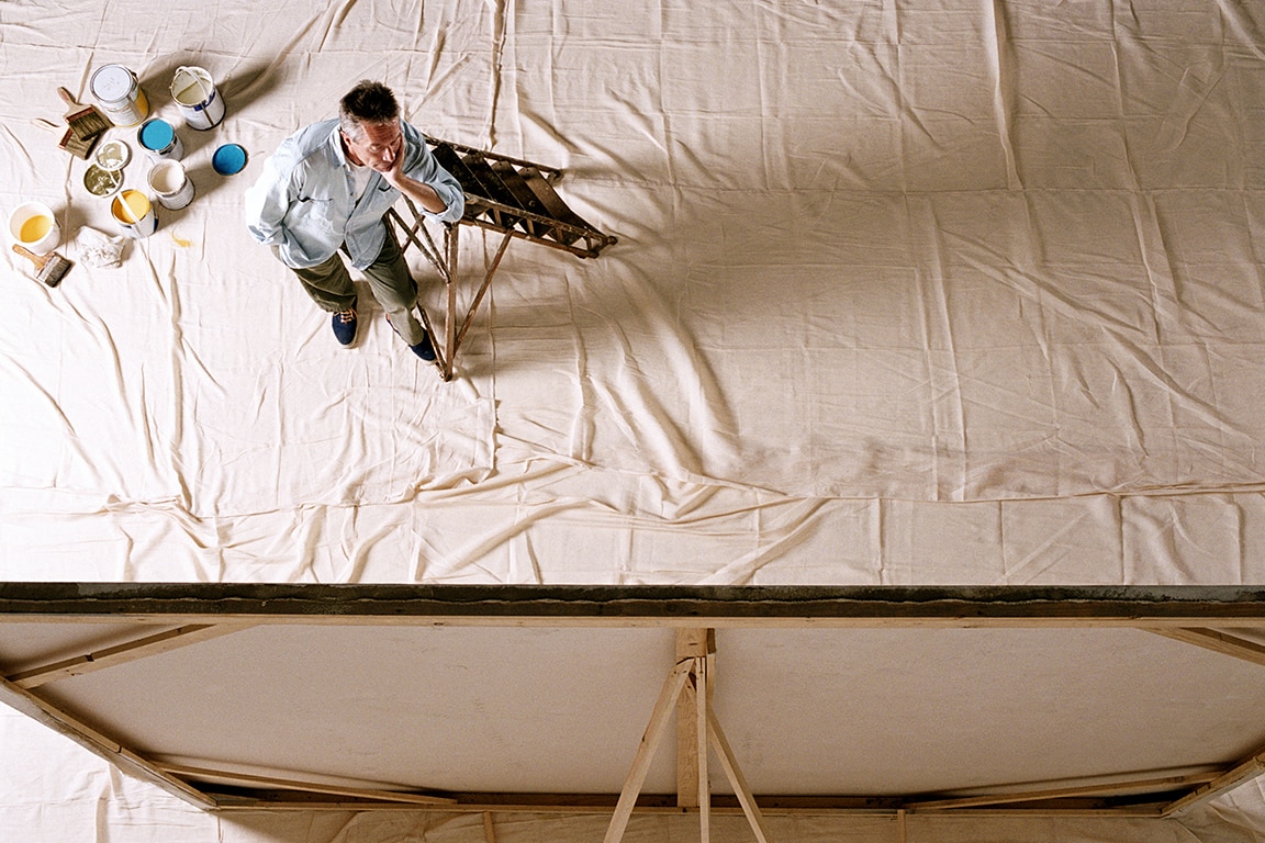 painter in front of his canvas