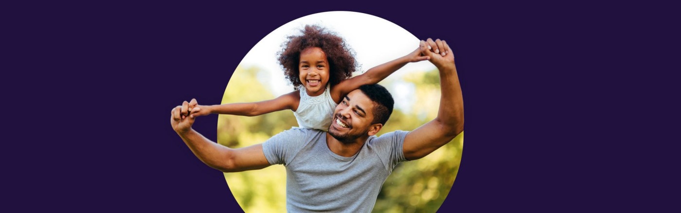 Father and daughter playing outdoors
