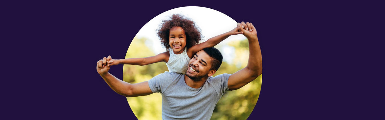 Father and daughter playing outdoors