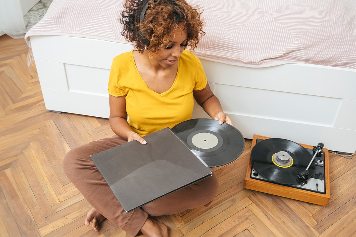 woman playing record