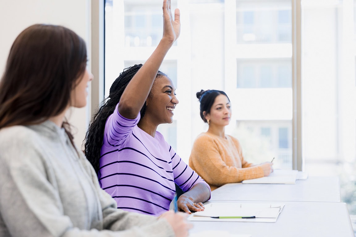 Student raising her hand