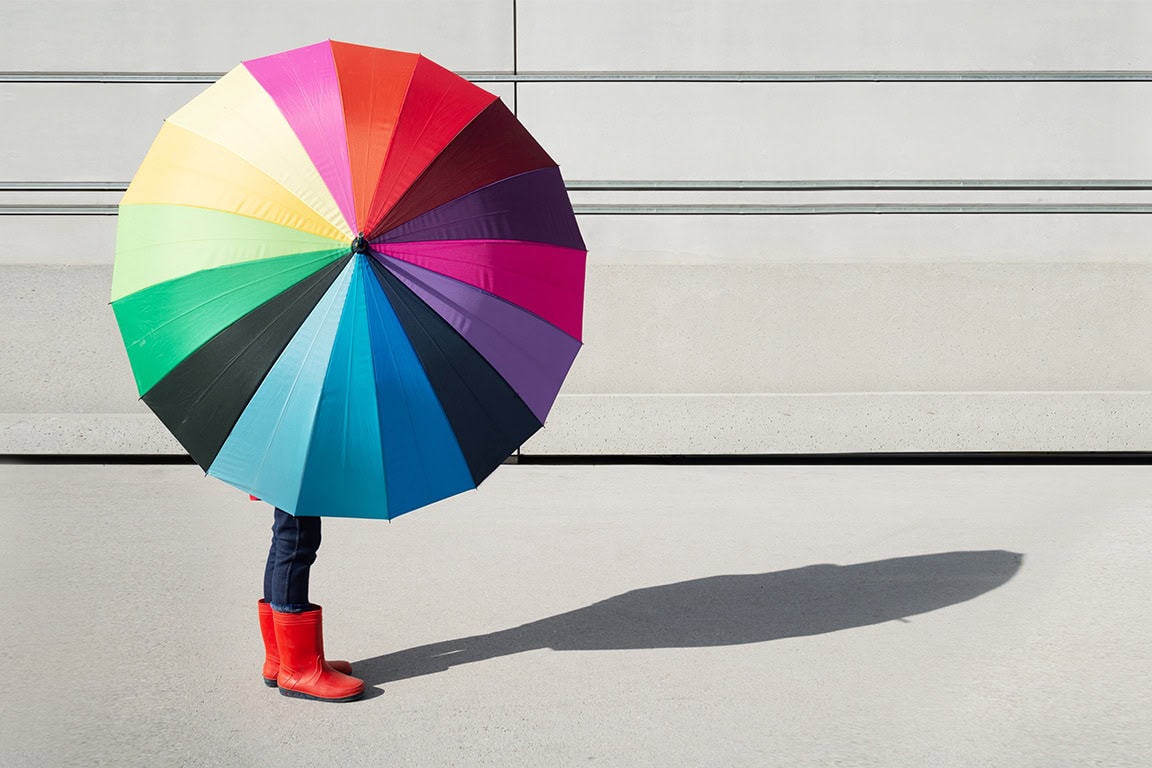 Person with a colorful umbrella