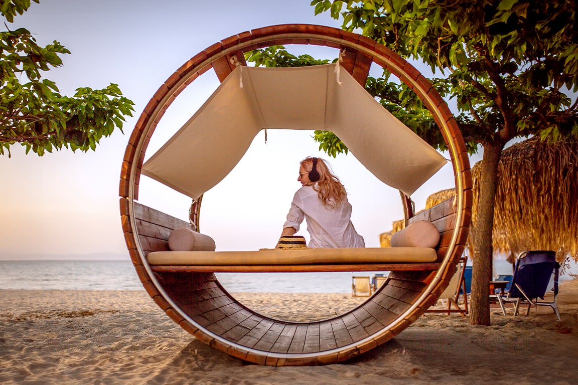 Woman relaxing by the beach