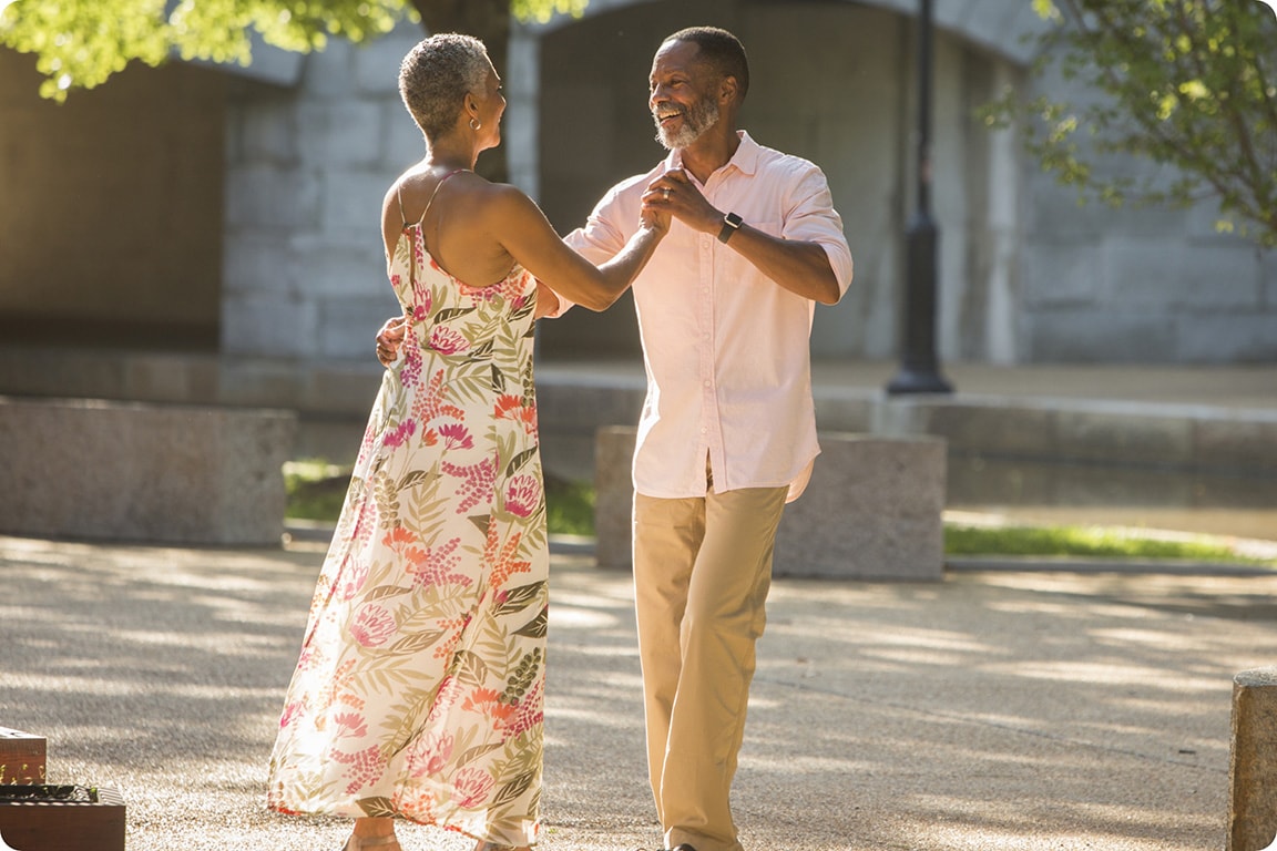 Couple dancing in the park