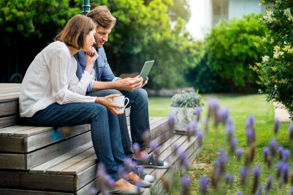 couple looking at iPad