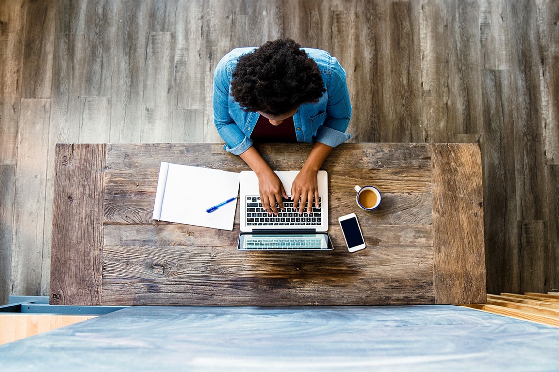 Person typing on a laptop