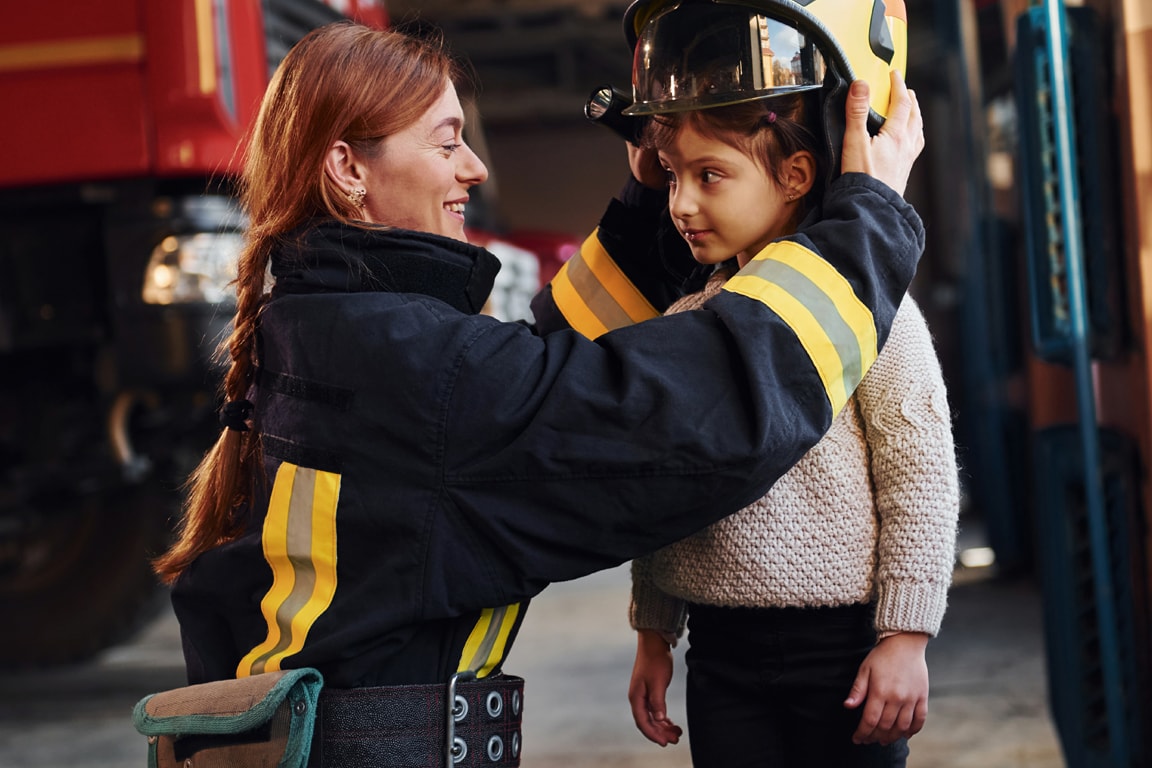 firefighter woman with kid