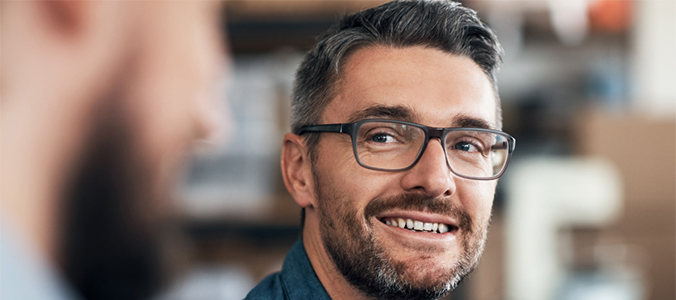 Young Hispanic man smiling