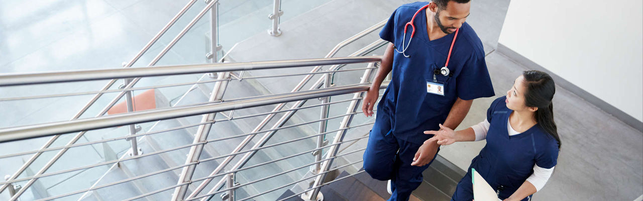 Two nurses walking 