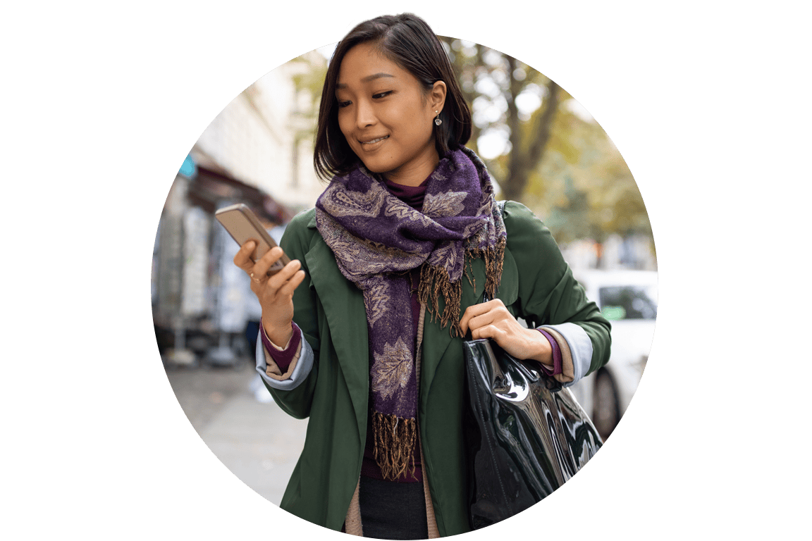 A woman looking at her phone