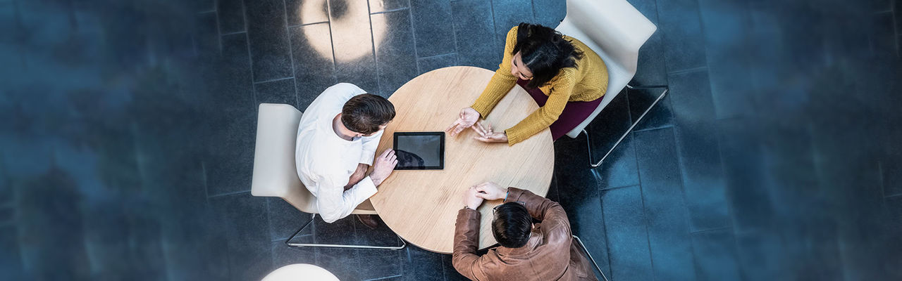 business meeting three people