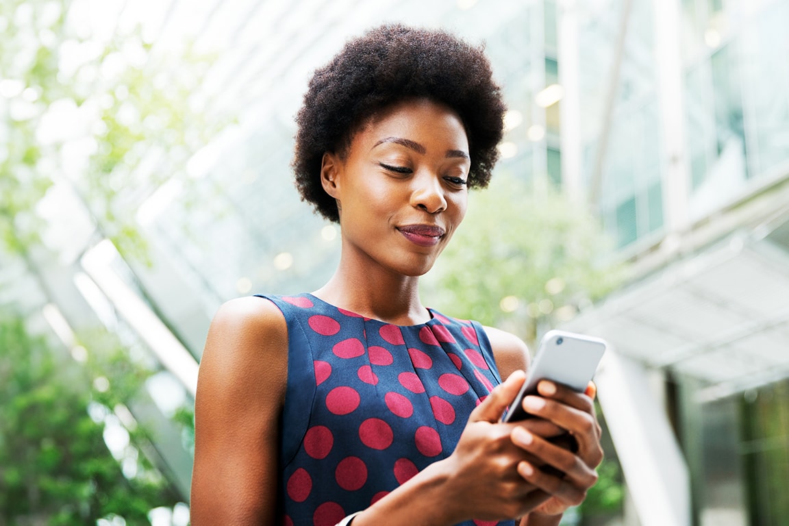 woman uses mobile phone