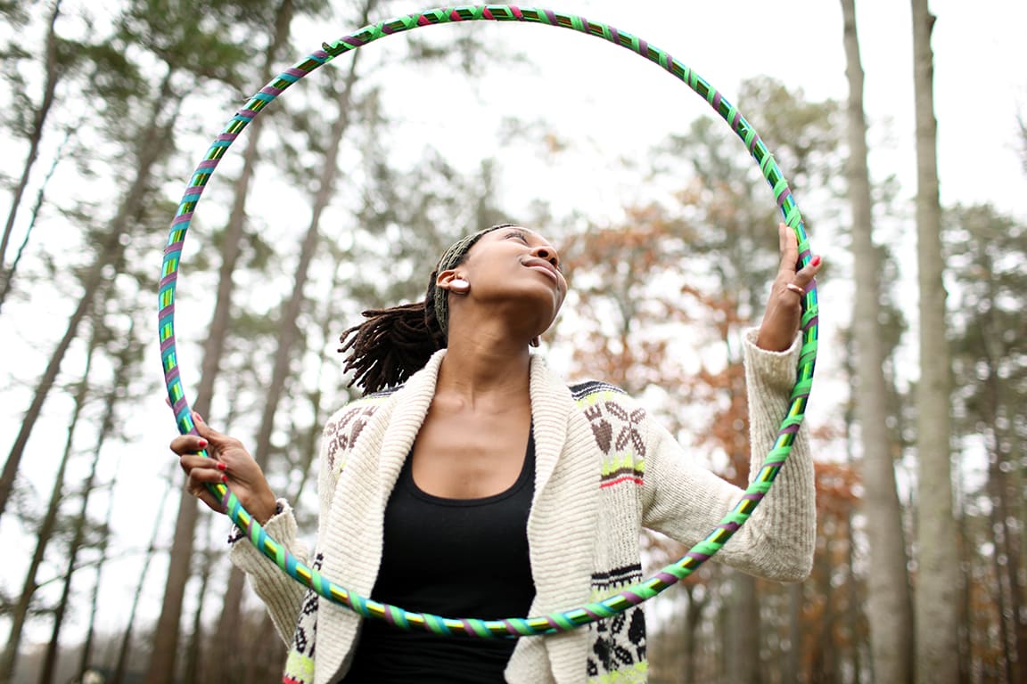 lady playing with hula hoop