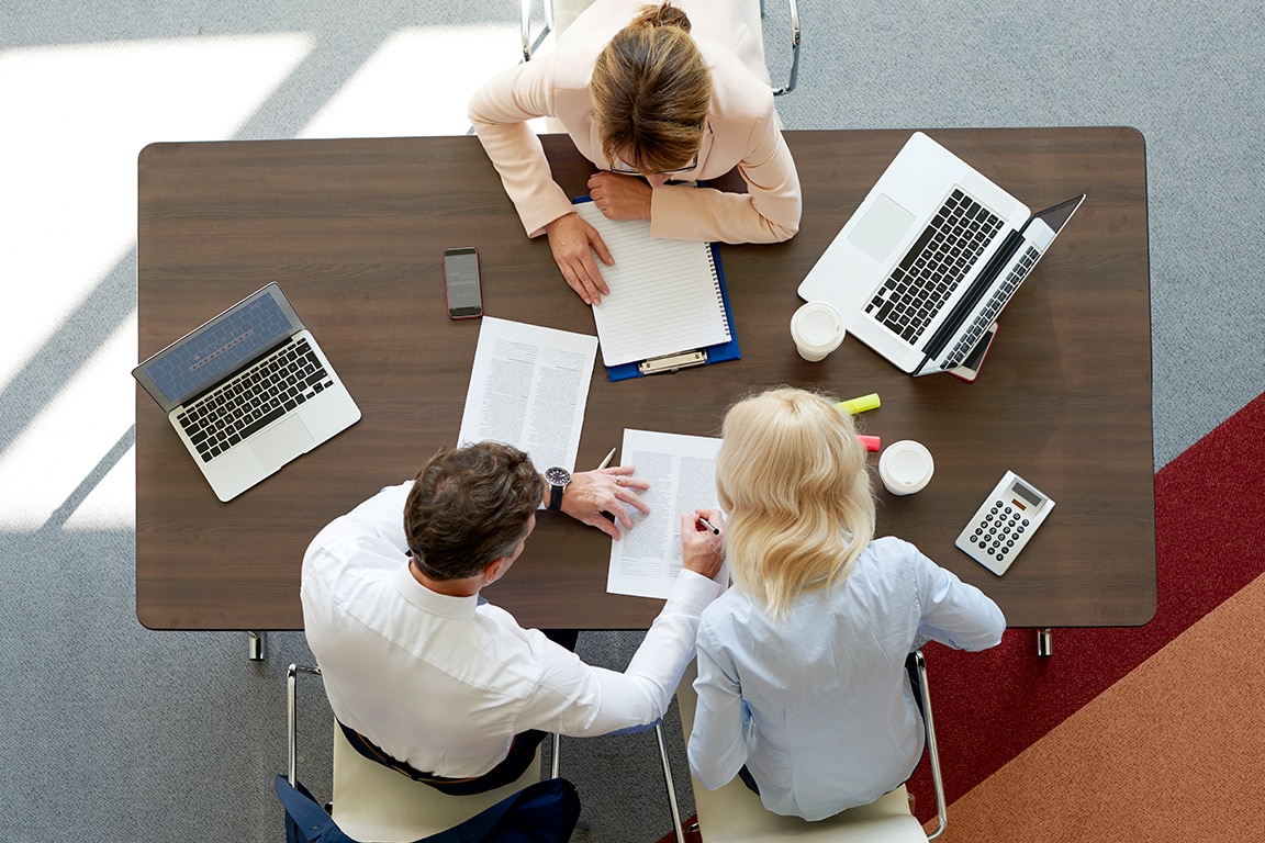 people gathered in a office
