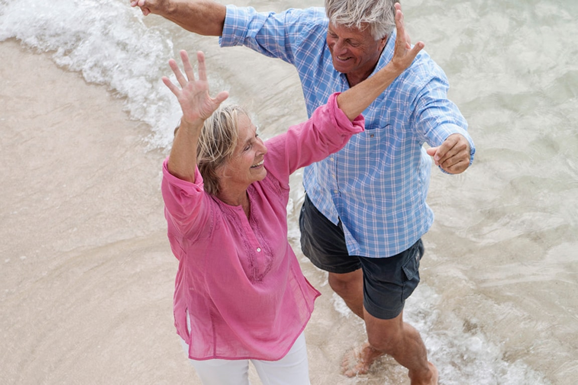 couple dancing at the beach