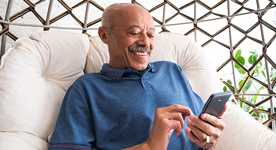 man looking at his phone