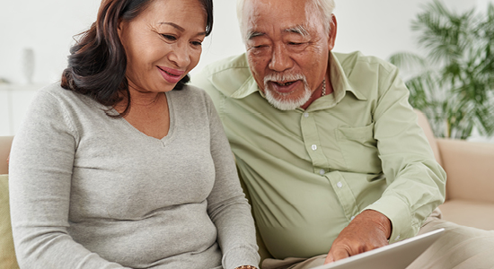 couple looking at iPad