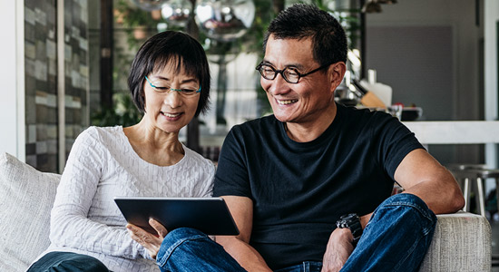 couple looking at iPad