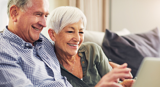 couple looking at iPad