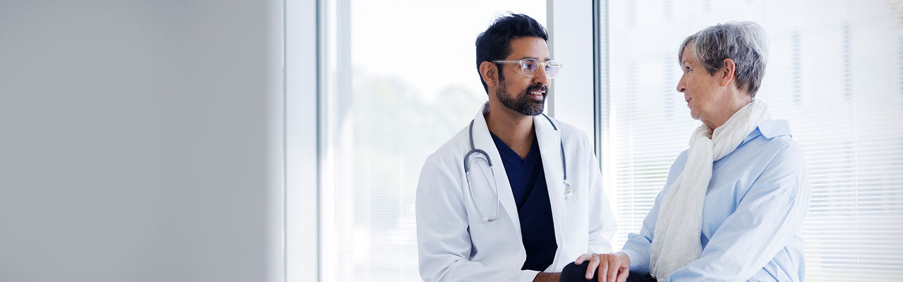 Doctor talking to patient