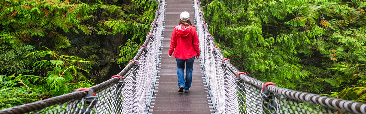 women walking through bridge