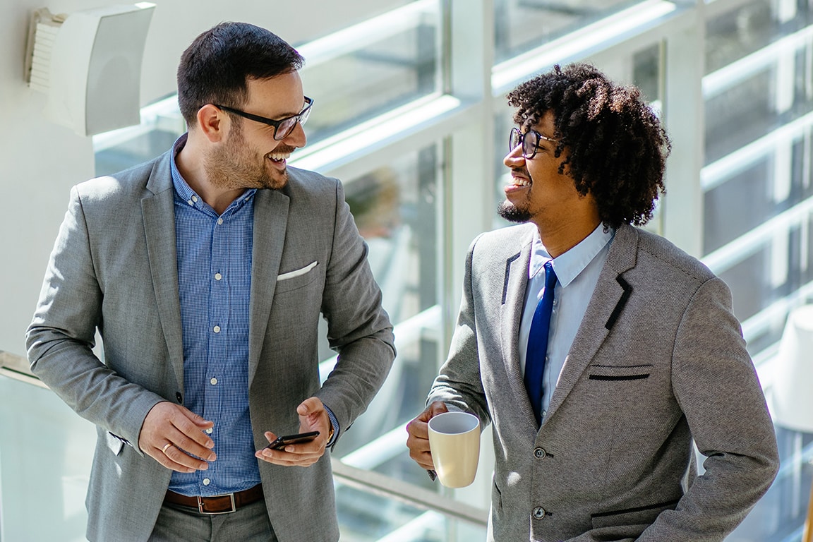 business people standing and talking