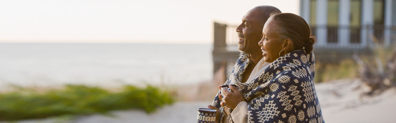 mature couple looking at the ocean