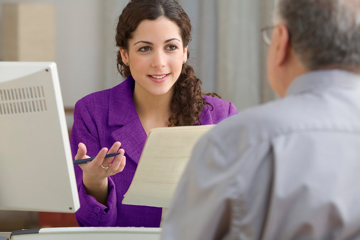 Business woman talking to a men