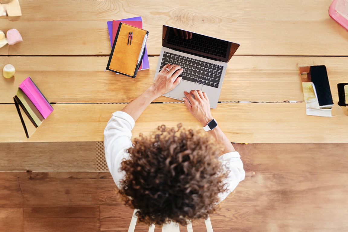 Person typing on a laptop